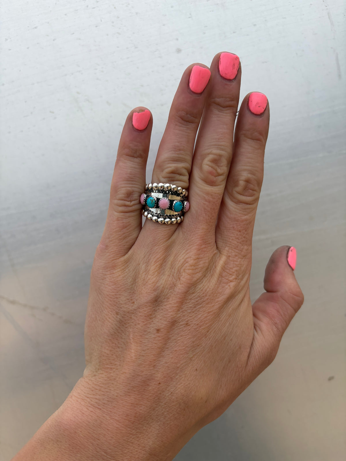Pink conch and Kingman ring