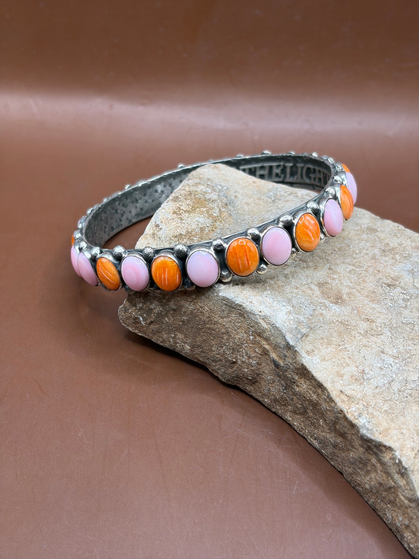 Pink conch and orange spiny Bangle